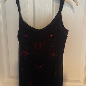 Long silhouette dress. Beaded with red flowers. Slip underneath